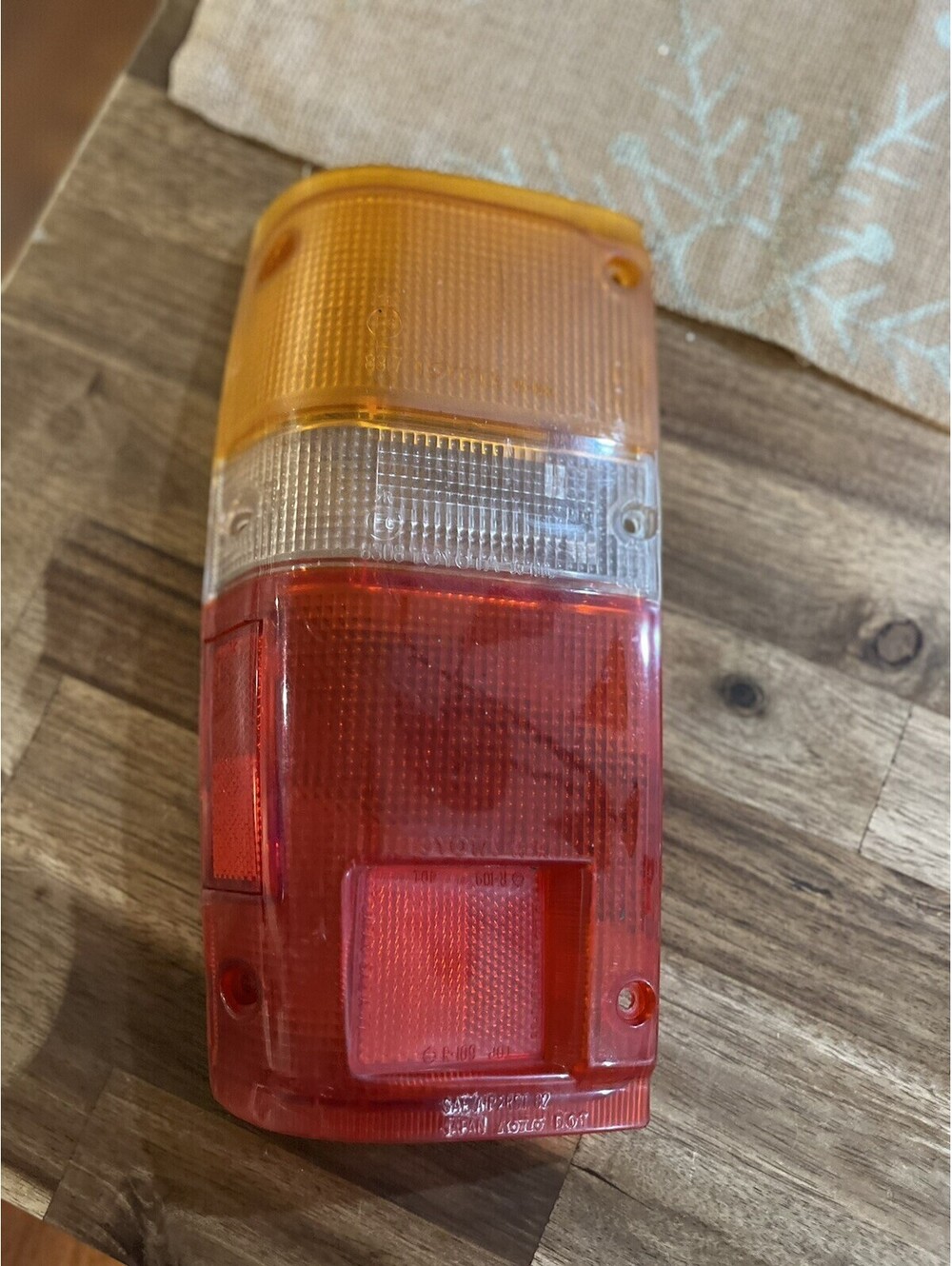 79-83 TOYOTA PICKUP TRUCK TAIL LIGHT LENS Cover  LEFT DRIVER REVERSE BRAKE OEM